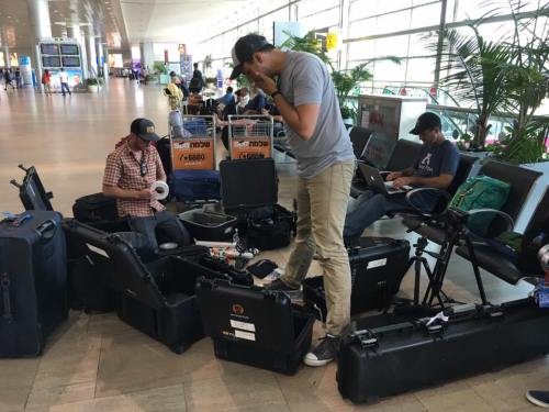 The Appian Media film crew gets ready for an international flight.